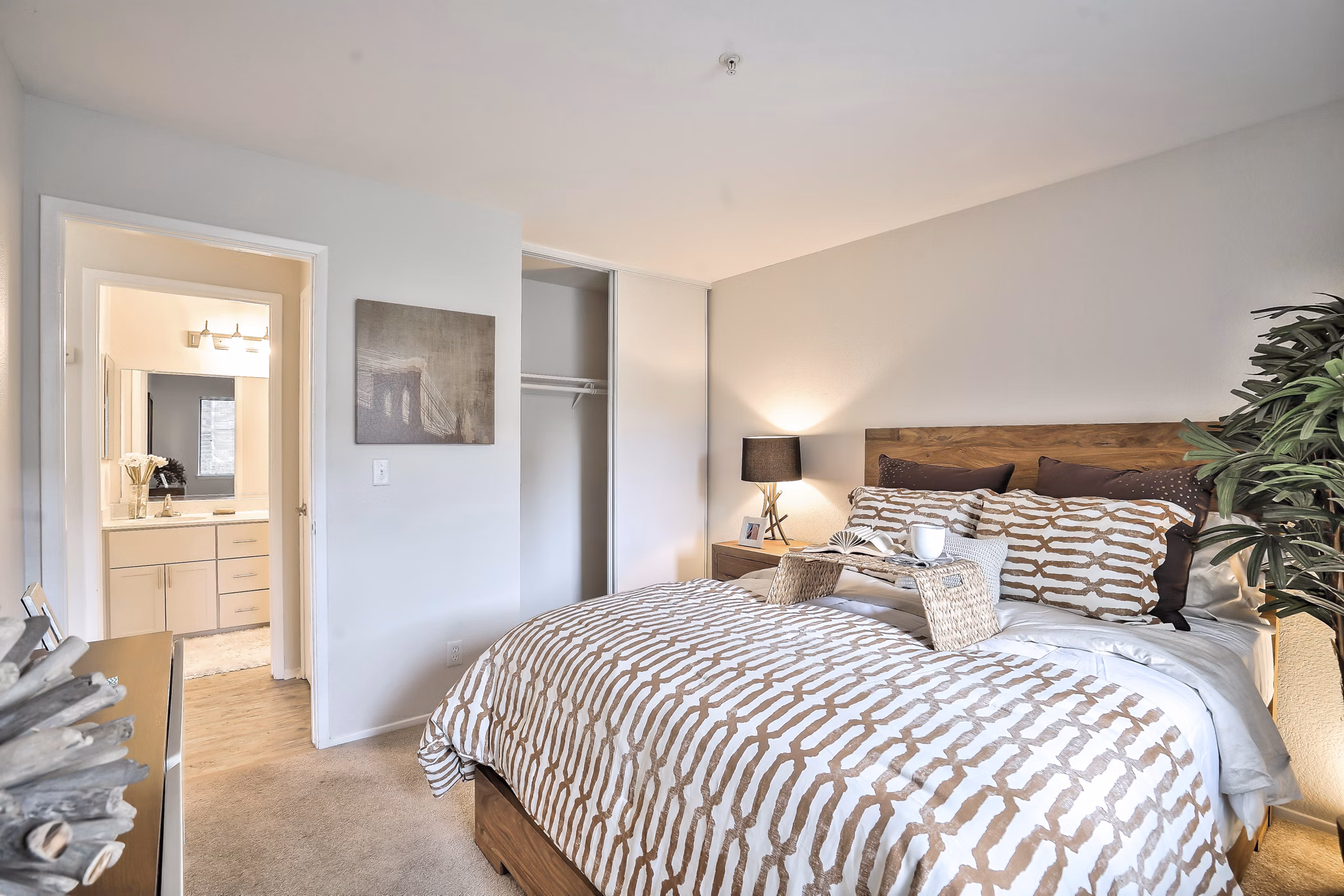 Cozy bedroom with modern decor in Alvista at the Bridge Apartments