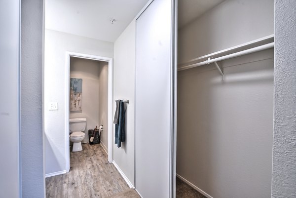 Bathroom featuring sleek finishes and modern fixtures in Alvista at the Bridge Apartments