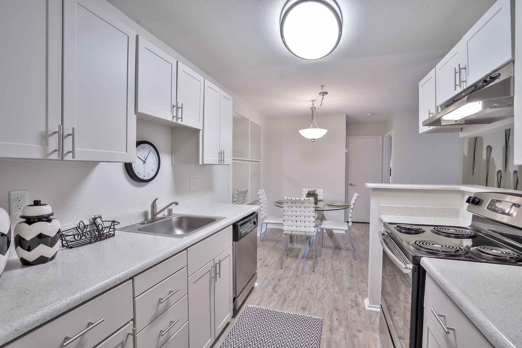 Modern kitchen featuring stainless steel appliances at Alvista at the Bridge Apartments Ideal for luxury living and culinary creativity