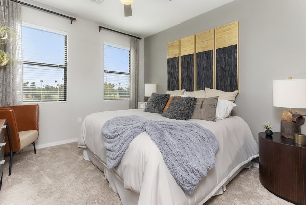 Luxurious bedroom with modern design at Summit at San Marcos Apartments Spacious layout with stylish decor for comfortable living