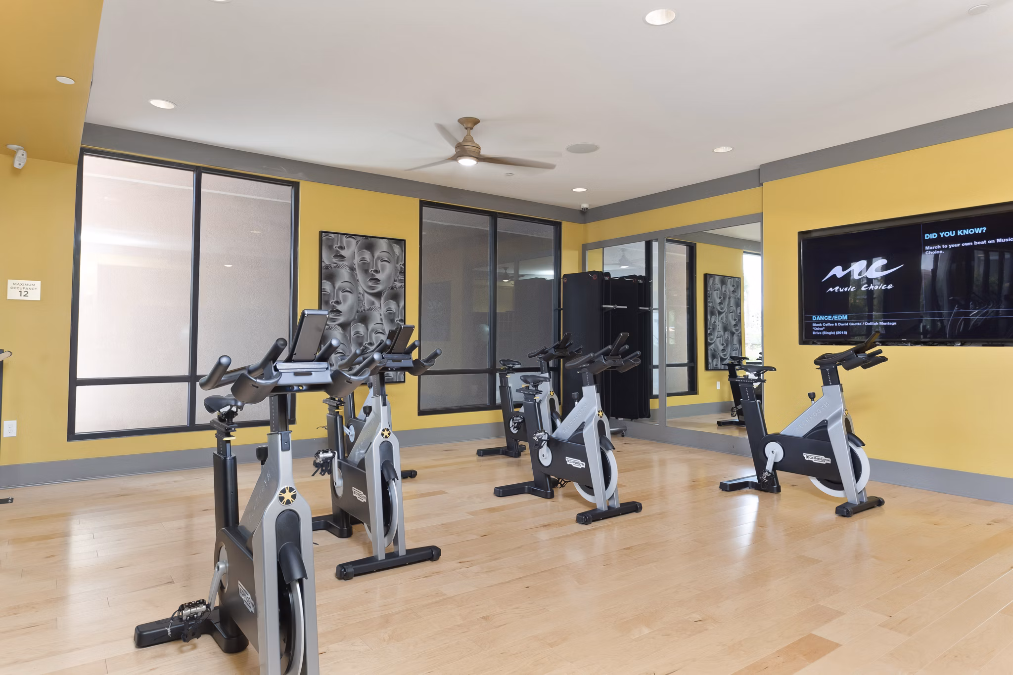 State-of-the-art yoga/spin studio at Summit at San Marcos Apartments offering fitness classes in a luxury setting