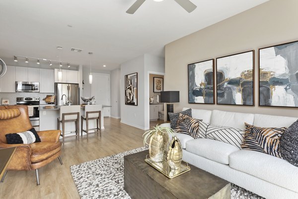 Elegant living room with modern decor at Summit at San Marcos Apartments