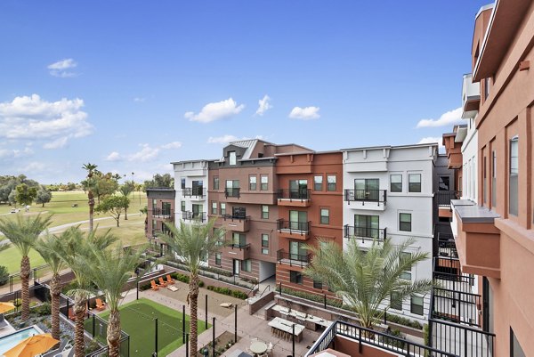 Summit at San Marcos: Elegant view of luxury apartments in serene setting