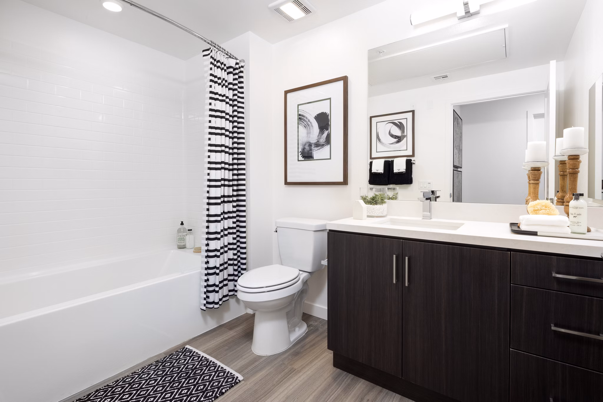 Bathroom with sleek modern fixtures in Boardwalk at Millenia Apartments