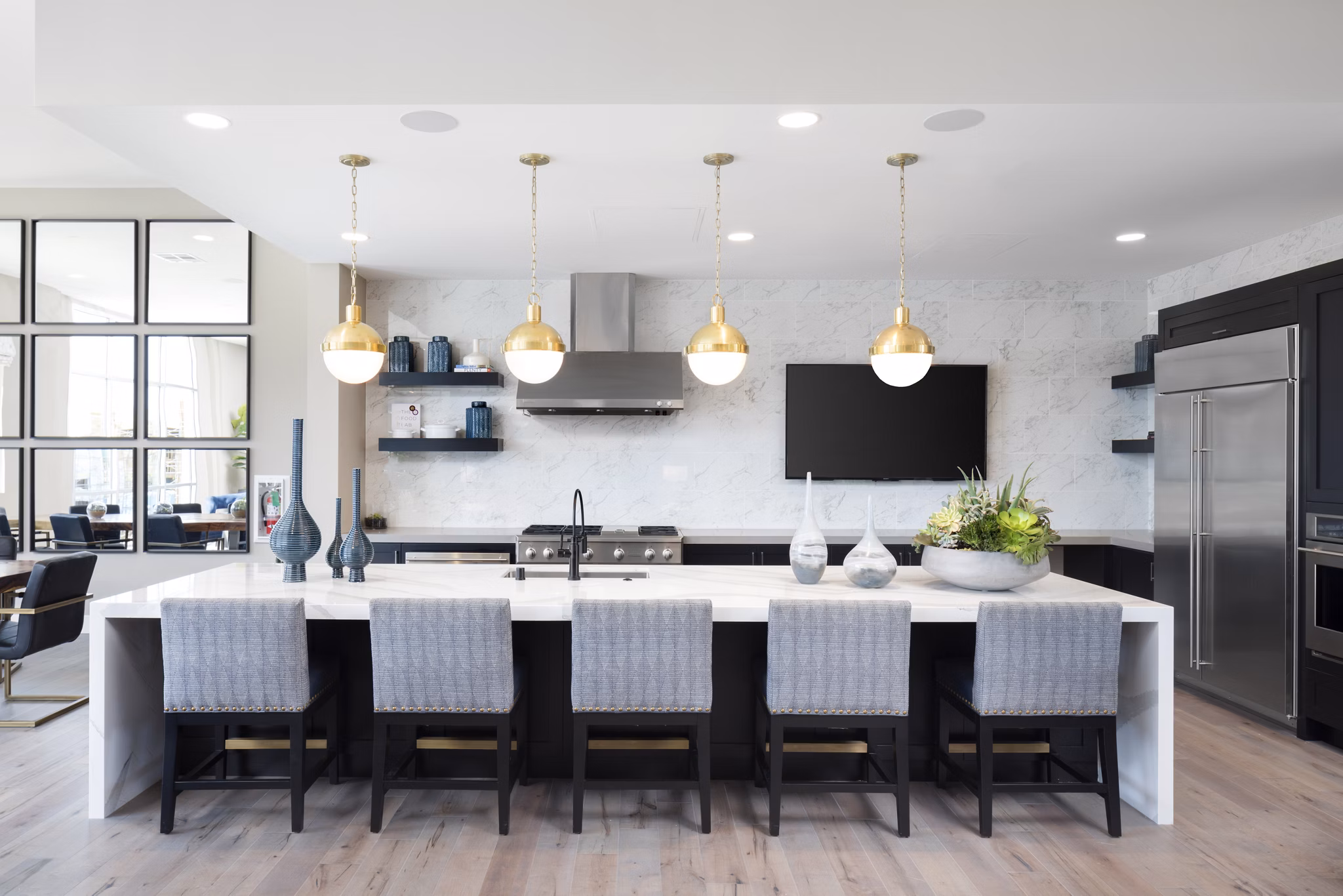 Elegant clubhouse at Boardwalk at Millenia Apartments featuring modern design and luxury amenities