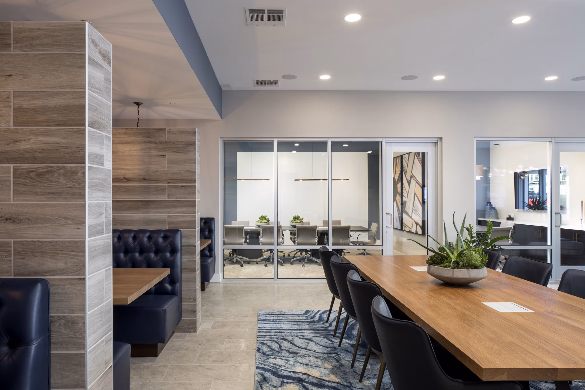 Contemporary clubhouse with sleek furnishings at Boardwalk at Millenia Apartments