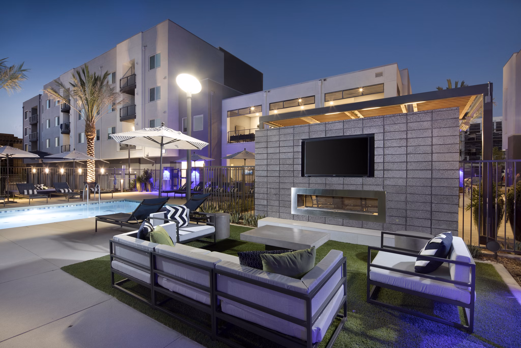 Cozy outdoor fire pit with seating at Boardwalk at Millenia Apartments, enhancing relaxation spaces