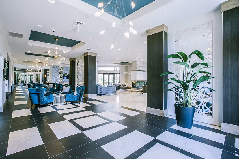Modern clubhouse lobby with contemporary furnishings at Peak 16 Apartments, offering luxury amenities in the heart of Phoenix