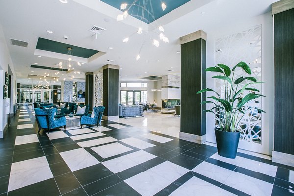 Modern clubhouse lobby with contemporary furnishings at Peak 16 Apartments, offering luxury amenities in the heart of Phoenix