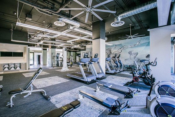State-of-the-art fitness center with modern equipment at Peak 16 Apartments