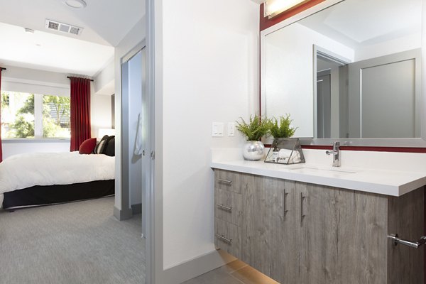 Modern bathroom with sleek fixtures in Vaya Apartments, luxury living by Greystar