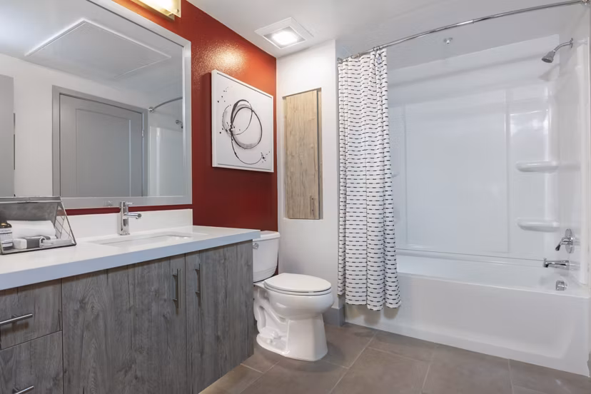 Elegant bathroom with modern fixtures at Vaya Apartments, luxury living by Greystar