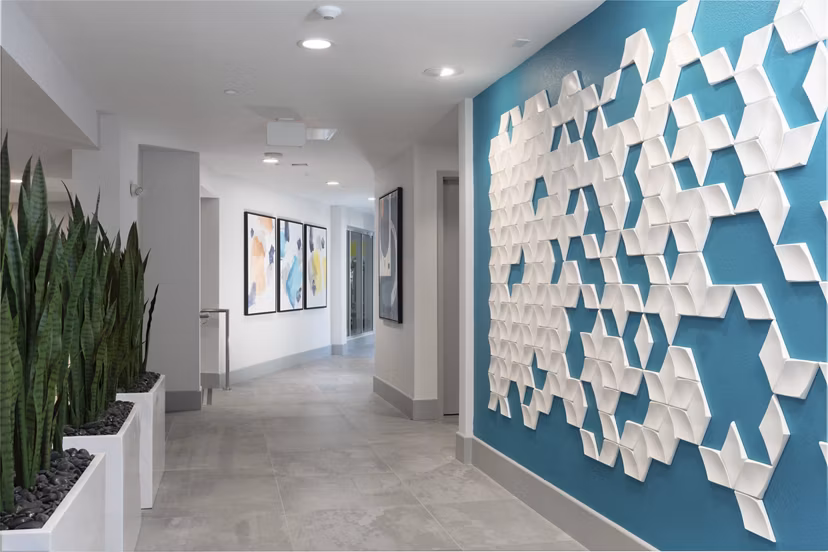 Vaya Apartments: Modern clubhouse featuring sleek interiors and social spaces