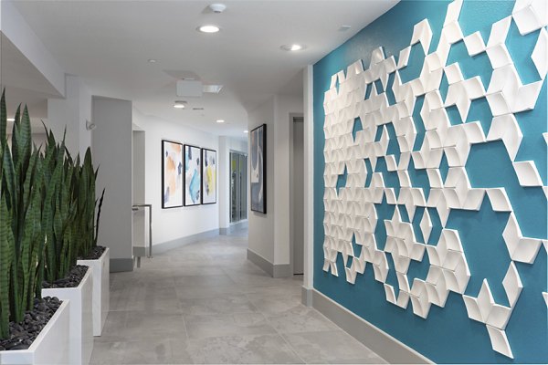 Vaya Apartments: Modern clubhouse featuring sleek interiors and social spaces