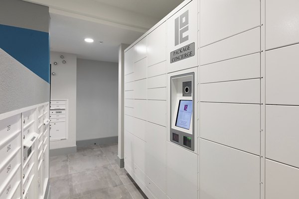 Mail room with secure package lockers at Vaya Apartments, a contemporary Greystar community