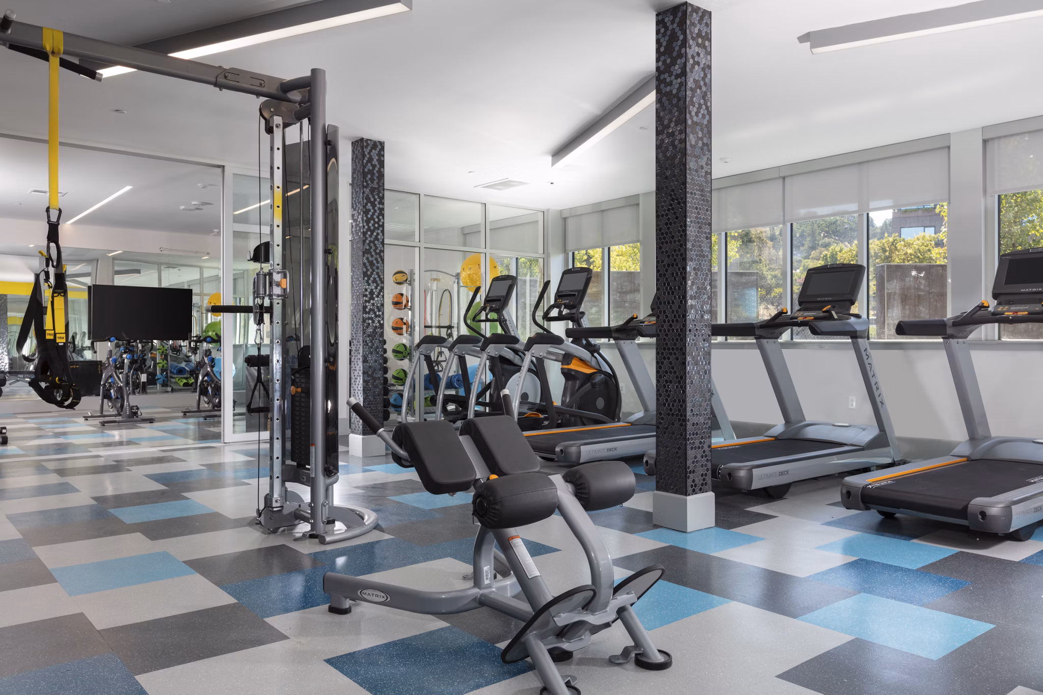 Modern fitness room with state-of-the-art equipment at Vaya Apartments in Greystar luxury community