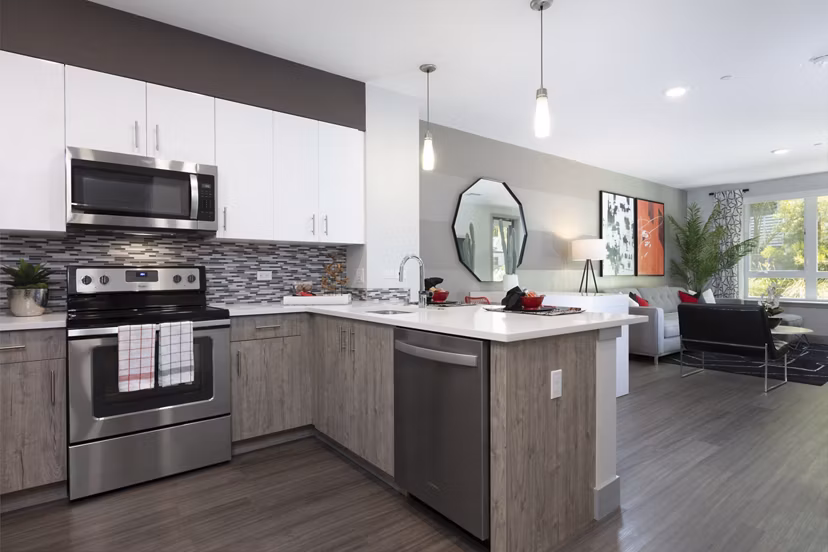 Modern kitchen with stainless steel appliances at Vaya Apartments in San Francisco
