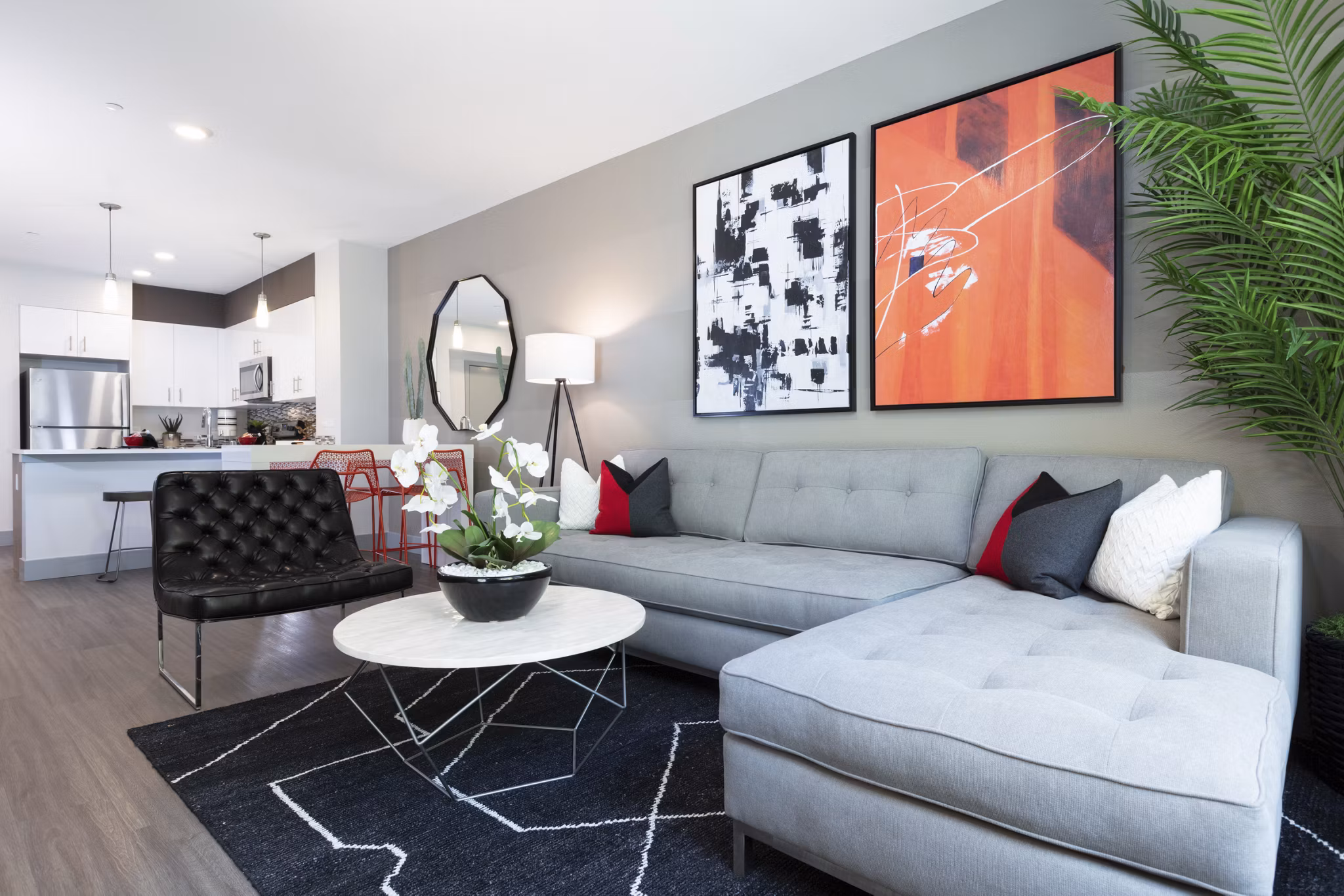 Cozy living room with plush seating and modern decor in Vaya Apartments