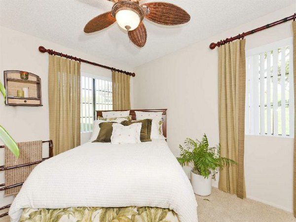 Cozy bedroom with stylish decor at Overlook at Bernardo Heights Apartments
