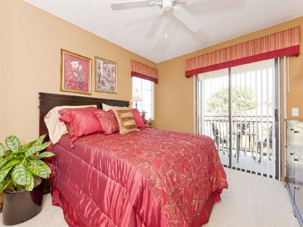 Cozy bedroom with natural lighting at Overlook at Bernardo Heights Apartments