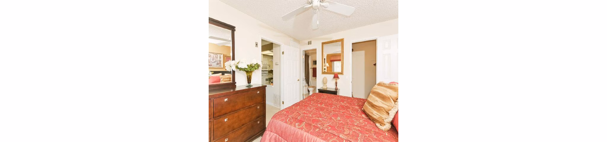 Bedroom featuring elegant hardwood floors at Overlook at Bernardo Heights Apartments