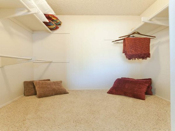 Closet with built-in shelving in Overlook at Bernardo Heights Apartments