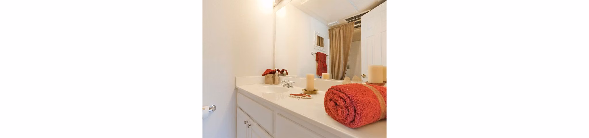 Bathroom featuring modern fixtures and marble countertops in Overlook at Bernardo Heights Apartments