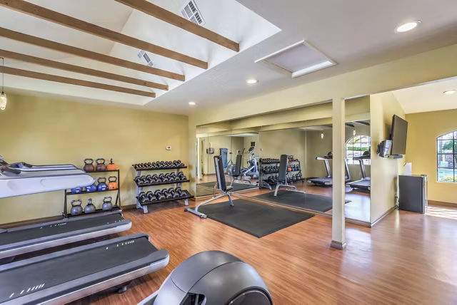 Fitness center with modern equipment at Overlook at Bernardo Heights Apartments