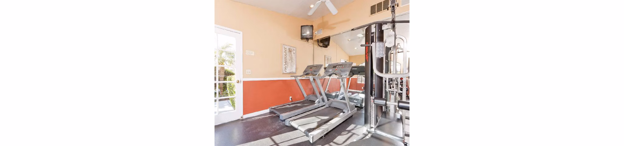 Fitness center with modern equipment at Overlook at Bernardo Heights Apartments