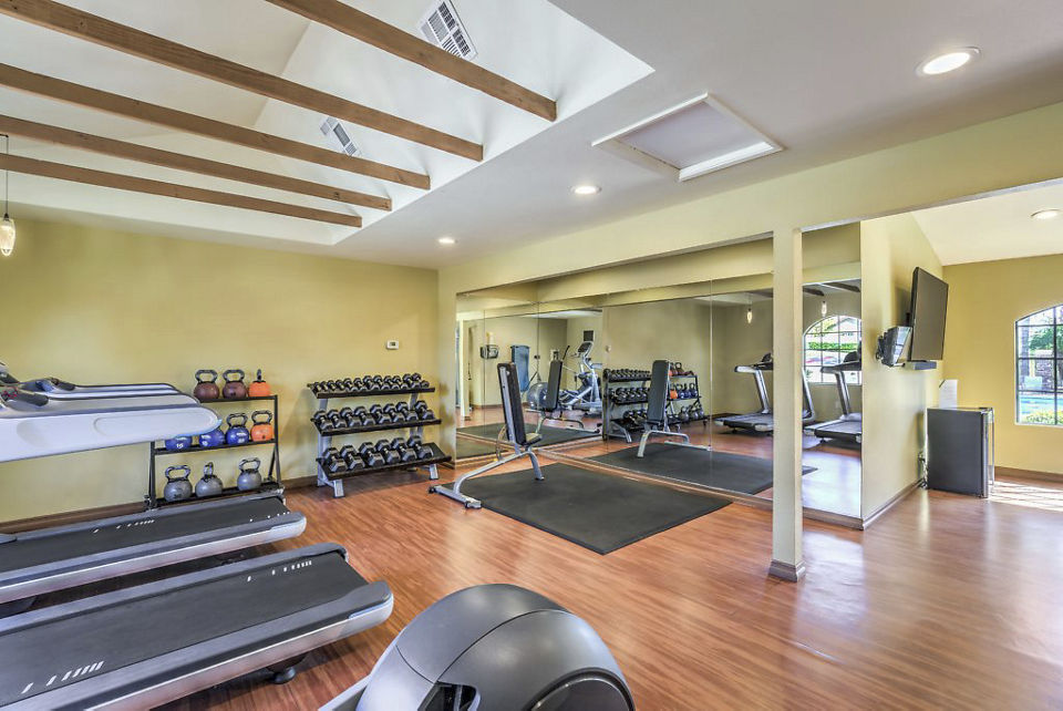 Fitness center with modern equipment at Overlook at Bernardo Heights Apartments