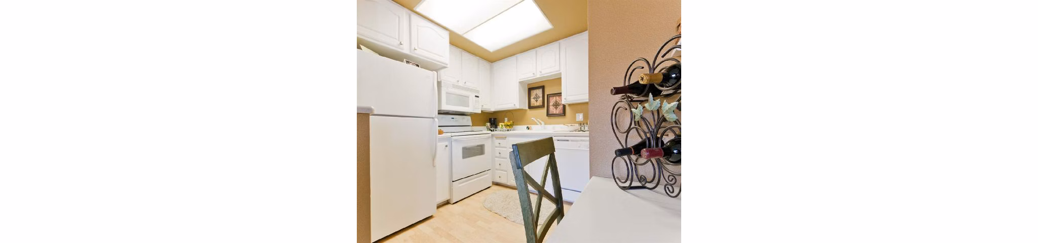 Modern kitchen with stainless steel appliances at Overlook at Bernardo Heights Apartments