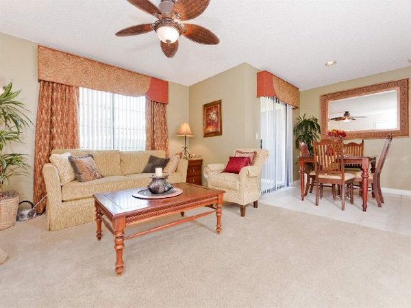 Inviting living room with elegant dÃ©cor and natural light at Overlook at Bernardo Heights Apartments