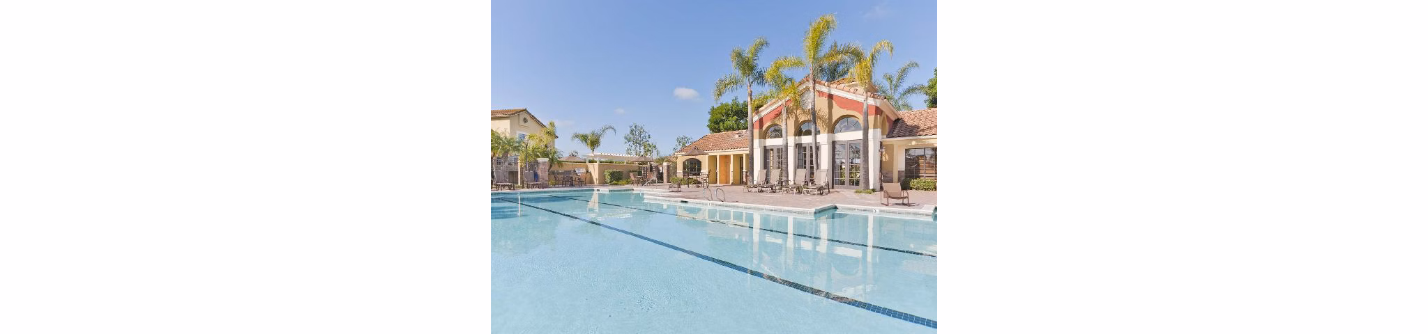 Luxurious pool with sun loungers at Overlook at Bernardo Heights Apartments