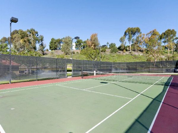 Outdoor sport court with basketball hoops at Overlook at Bernardo Heights Apartments