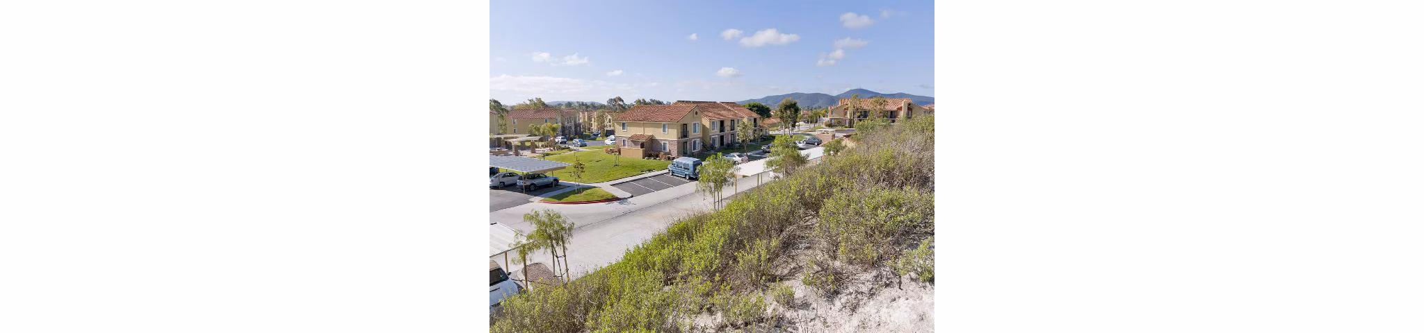 Expansive view from balcony at Overlook at Bernardo Heights Apartments, showcasing scenic city landscapes