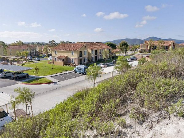 Expansive view from balcony at Overlook at Bernardo Heights Apartments, showcasing scenic city landscapes