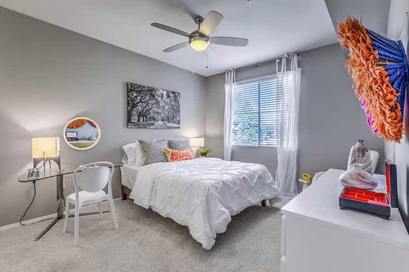 Cozy bedroom with elegant decor at Regents Court Apartments: luxury living near downtown