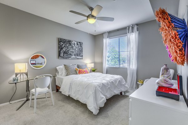 Cozy bedroom with elegant decor at Regents Court Apartments: luxury living near downtown