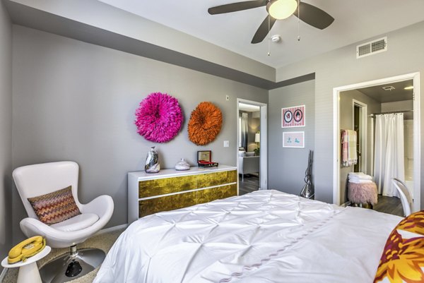 Cozy bedroom with modern decor at Regents Court Apartments