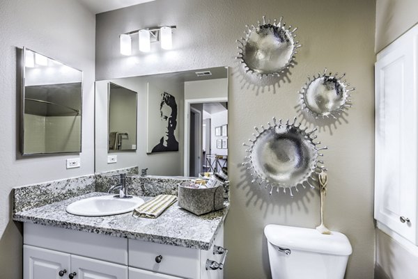 Bathroom featuring modern fixtures and sleek design at Regents Court Apartments