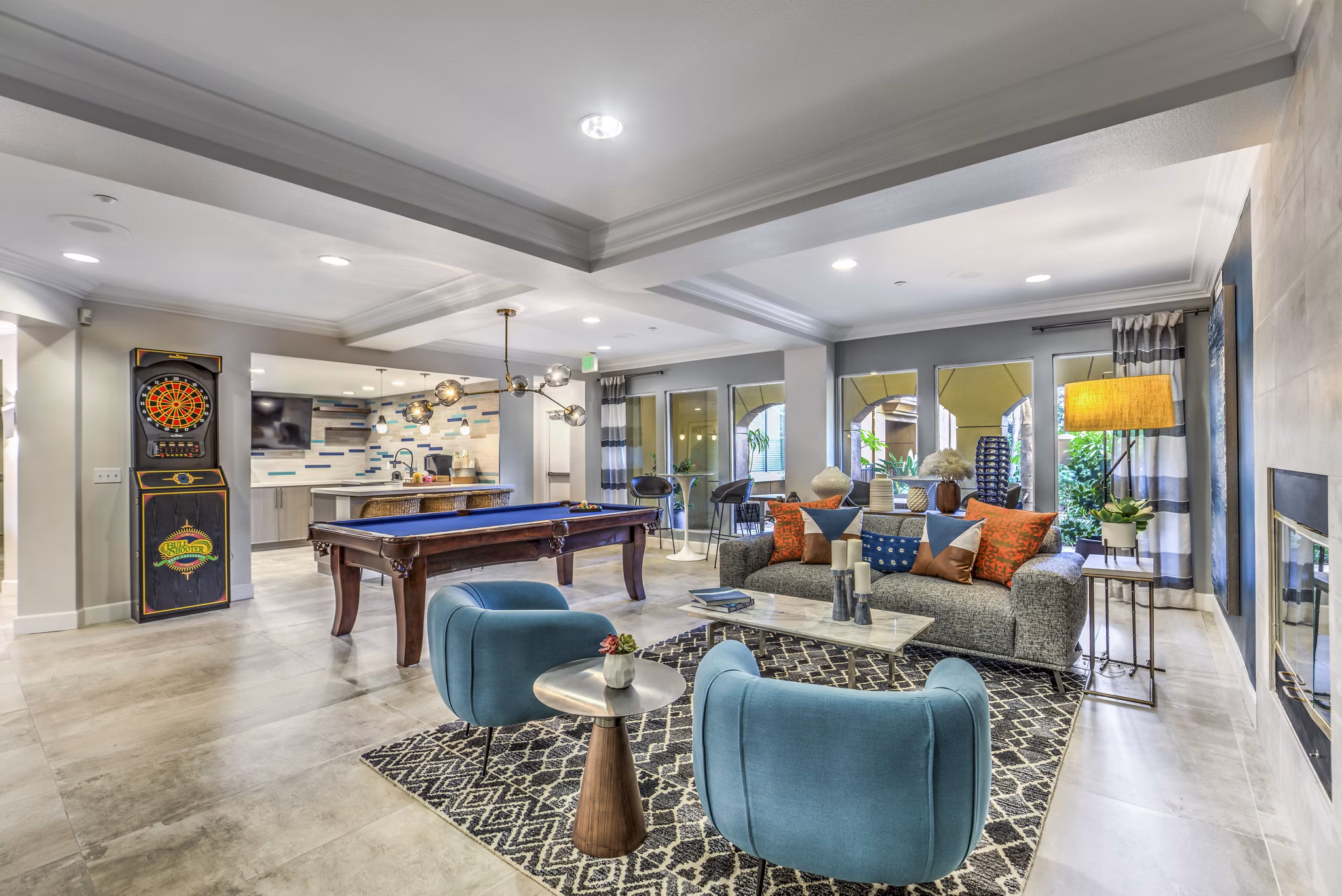 Clubhouse with modern design and comfortable seating at Regents Court Apartments, a Greystar luxury apartment community