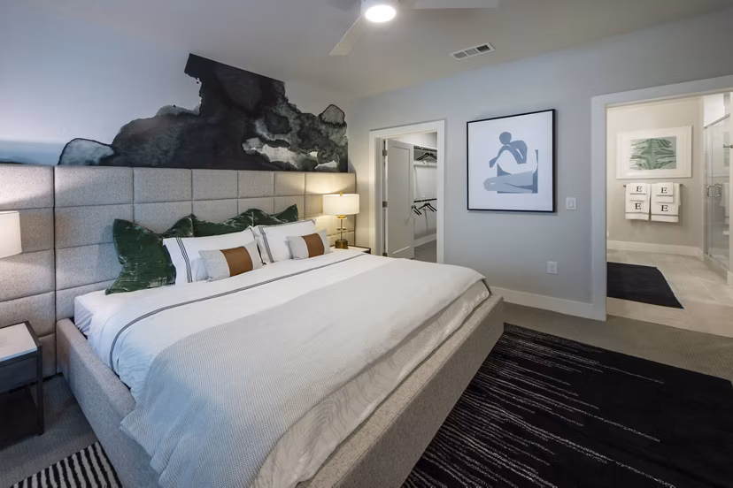 Cozy bedroom with modern furnishings at Ellison Heights Apartments
