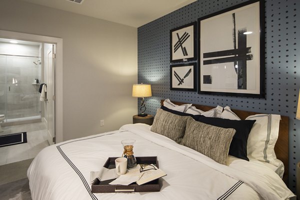 Spacious bedroom with natural light at Ellison Heights Apartments