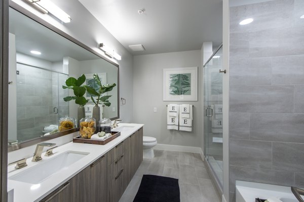 Modern bathroom with sleek fixtures at Ellison Heights Apartments, luxury living by Greystar