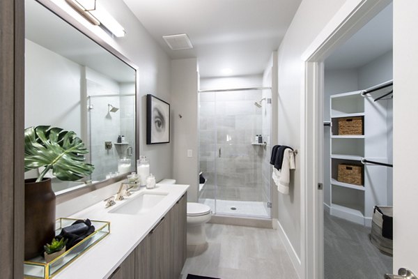 Modern bathroom with sleek fixtures in Ellison Heights Apartments