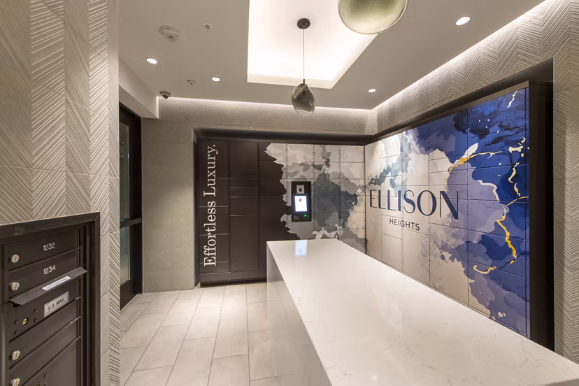 Modern mailroom with secure package lockers at Ellison Heights Apartments, providing convenient parcel management for residents