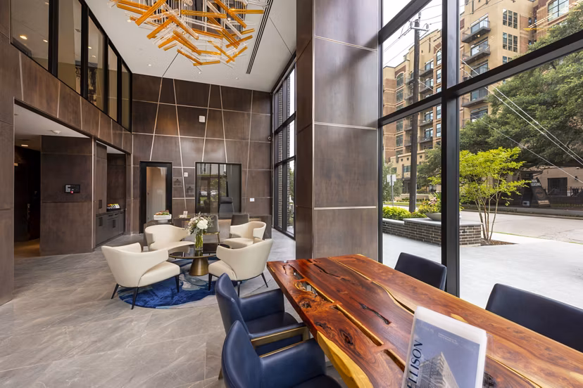 Clubhouse featuring modern design and ample seating at Ellison Heights Apartments