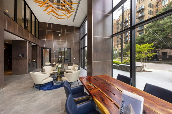 Clubhouse featuring modern design and ample seating at Ellison Heights Apartments