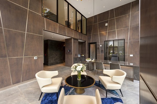 Clubhouse featuring modern design and luxurious seating at Ellison Heights Apartments