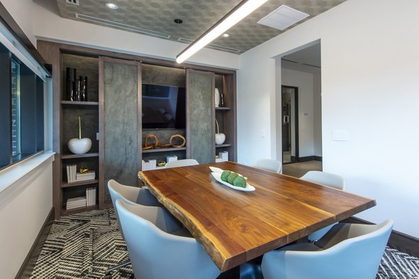 Meeting facility with modern conferencing setup at Ellison Heights Apartments, ideal for corporate gatherings and events